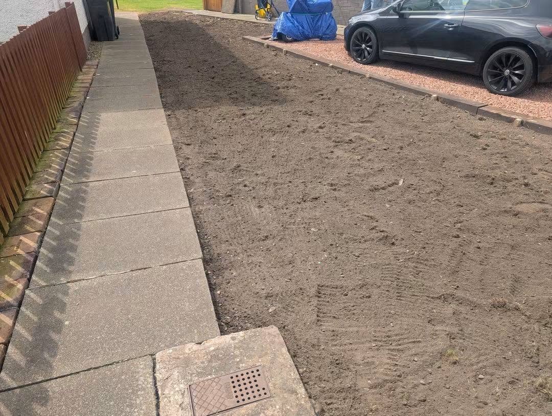Rotovated & new lawn seeded — before